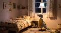 Dinosaur_lamp_illuminates_bedroom_9107e204_2K.jpg